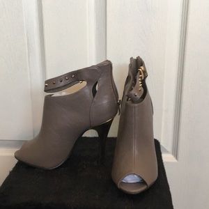 Gray and gold booties